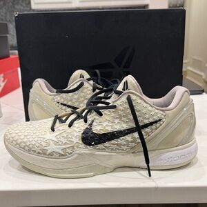 Nike men’s Cream and Black Athletic Shoes